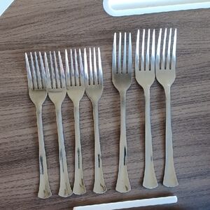 3 Bigger Forks and 4 Smaller Forks